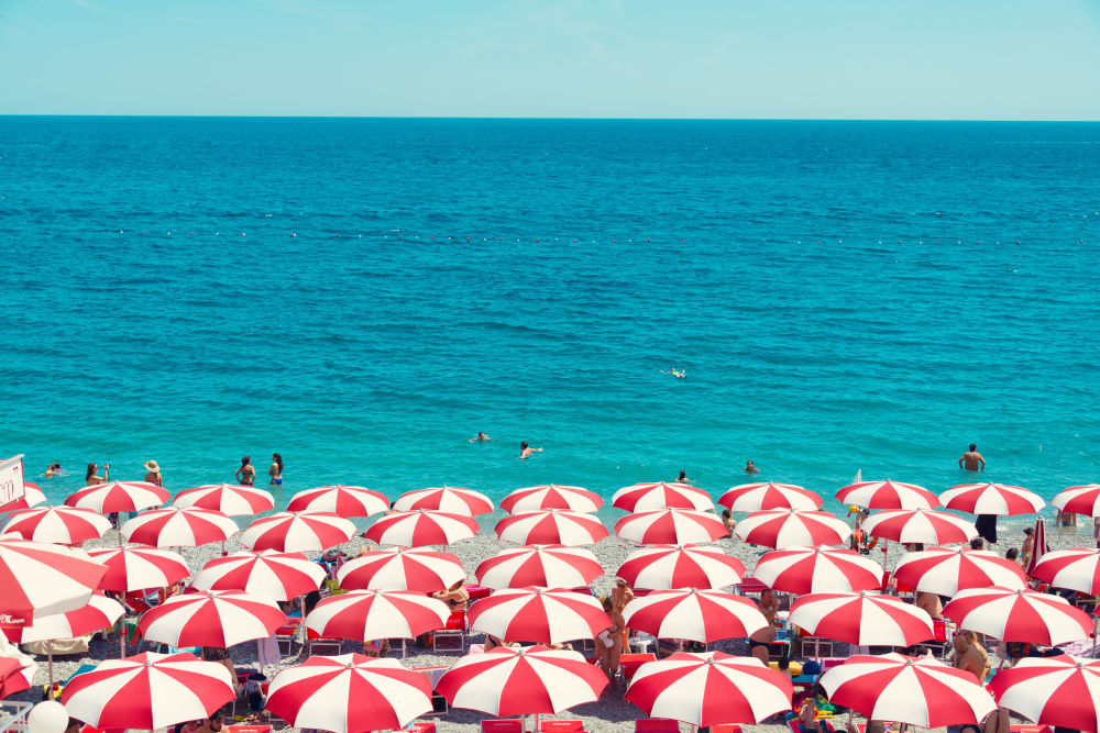Photography by Gray Malin of Amalfi Candy Cane Umbrellas