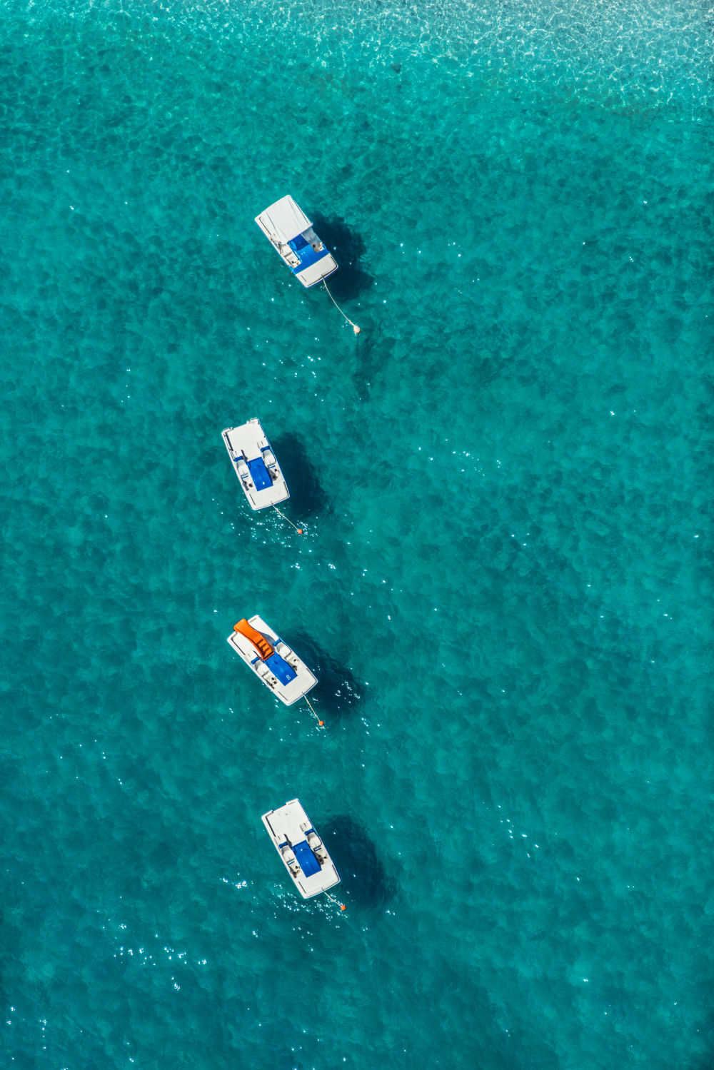 Photography by Gray Malin of Amalfi Paddle Boats