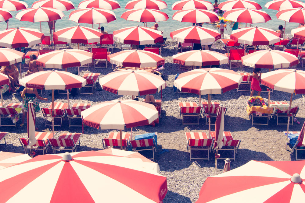 Photography by Gray Malin of Amalfi Red and White Umbrellas