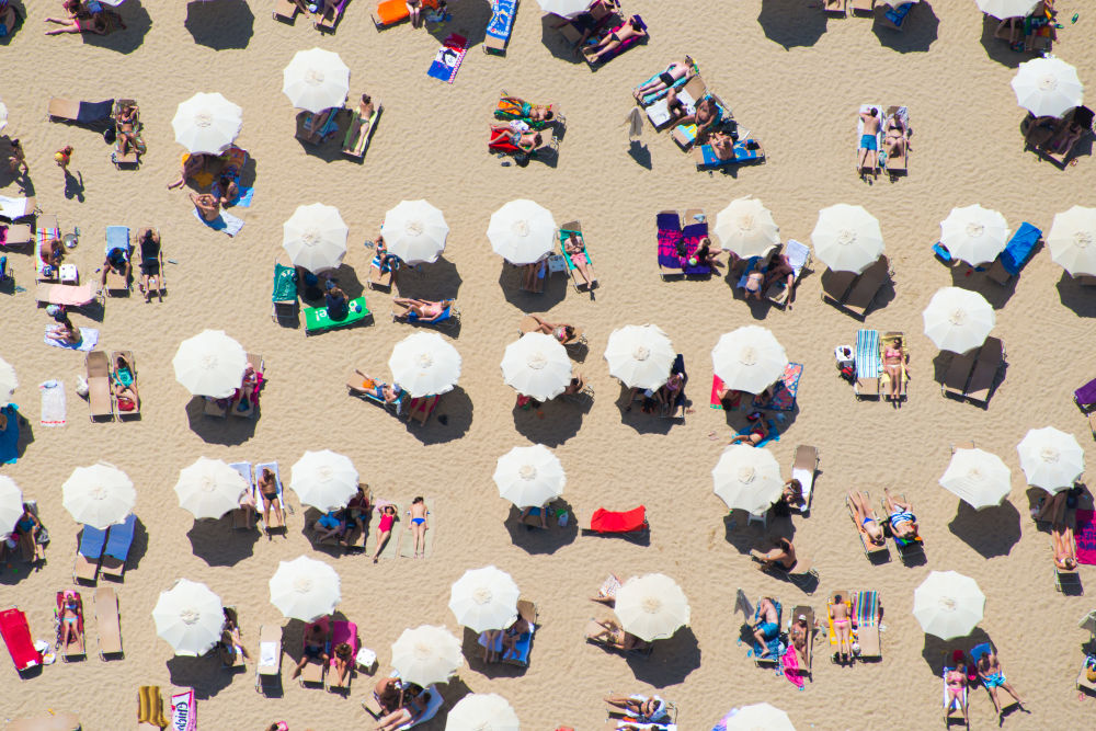 Photography by Gray Malin of Barcelona Beach Umbrellas