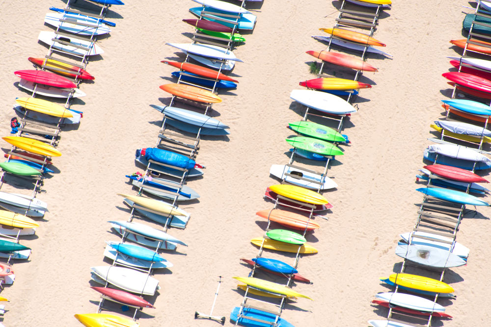 Photography by Gray Malin of Beach Kayaks