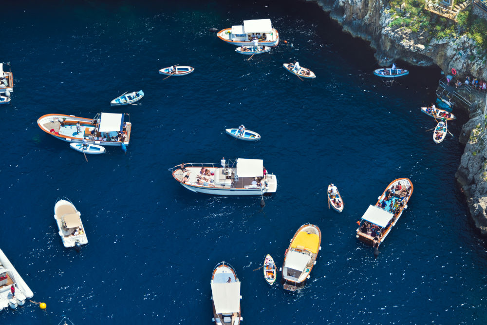 Photography by Gray Malin of Capri Blue Grotto Boats