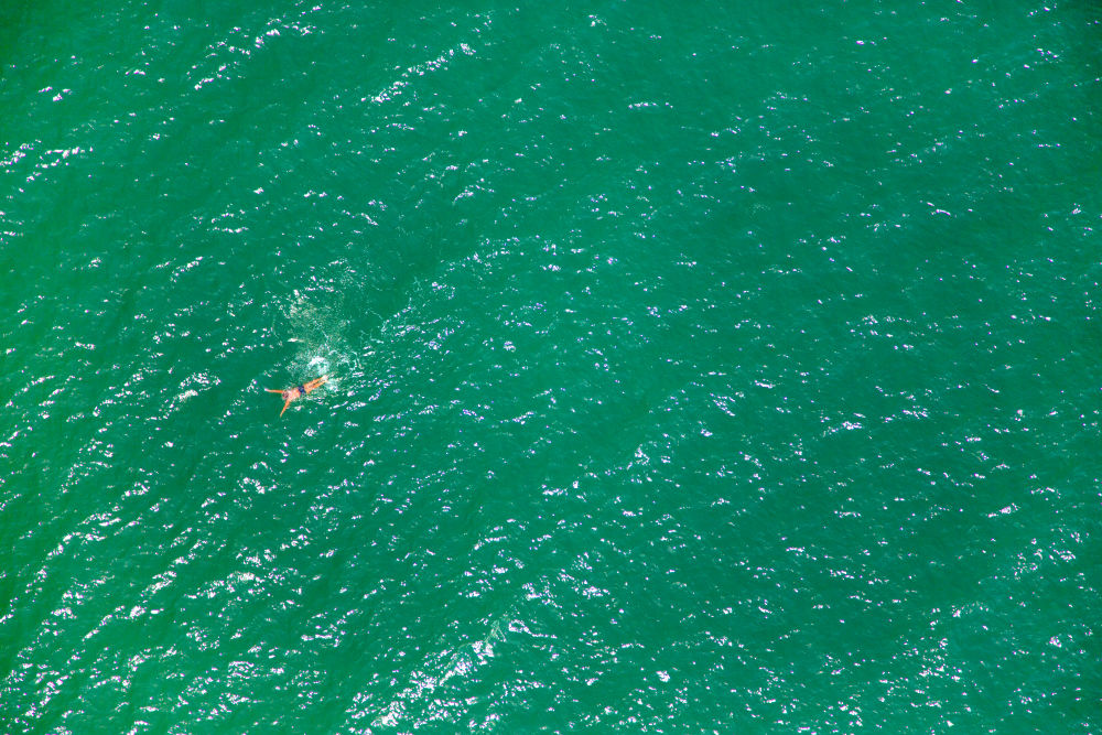 Photography by Gray Malin of Hamptons Lone Swimmer