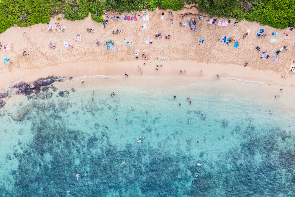 Photography by Gray Malin of Kapalua Sunbathers, Maui