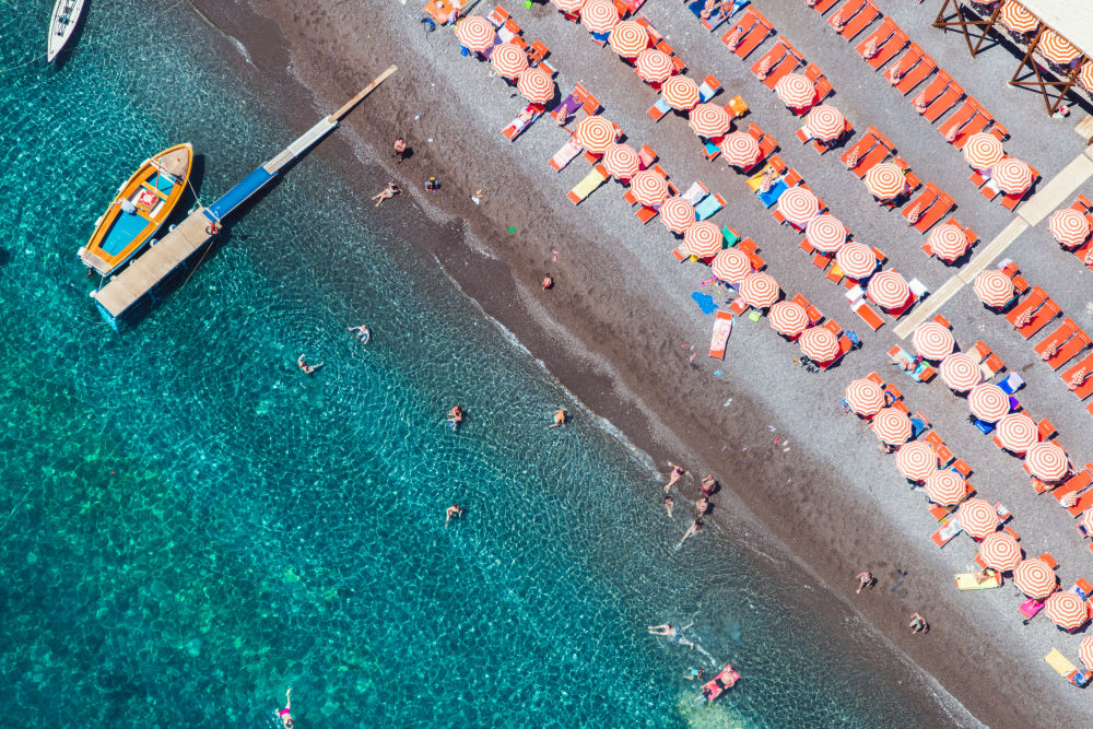Photography by Gray Malin of Lido di Conca Wooden Boat