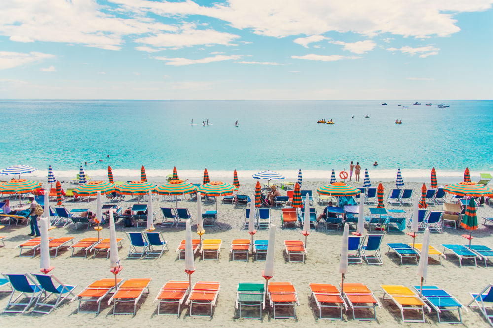 Photography by Gray Malin of Multi Color Chairs, Cinque Terre