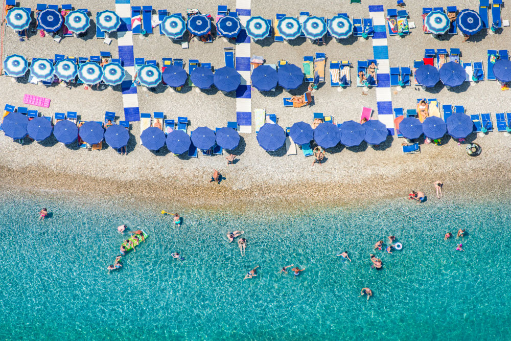 Photography by Gray Malin of Positano Blue Umbrellas