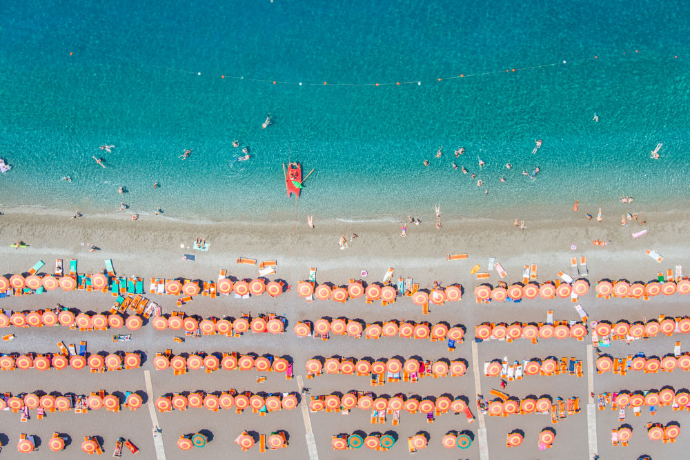 Photography by Gray Malin of Positano Orange Umbrellas