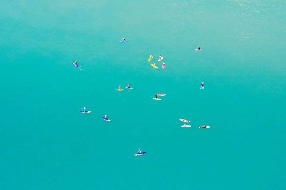 Photography by Gray Malin of Rio Paddle Boarders Horizontal