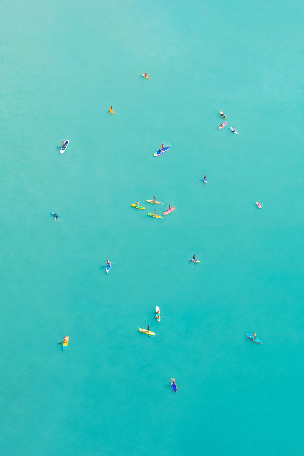 Photography by Gray Malin of Rio Paddle Boarders Vertical