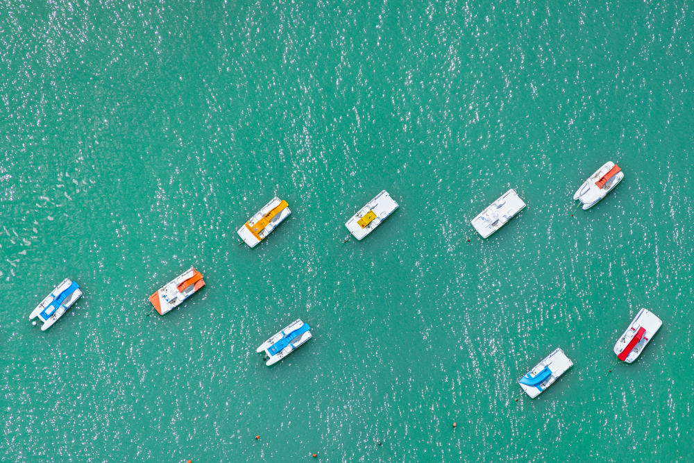 Photography by Gray Malin of Rivazzurra Paddle Boats