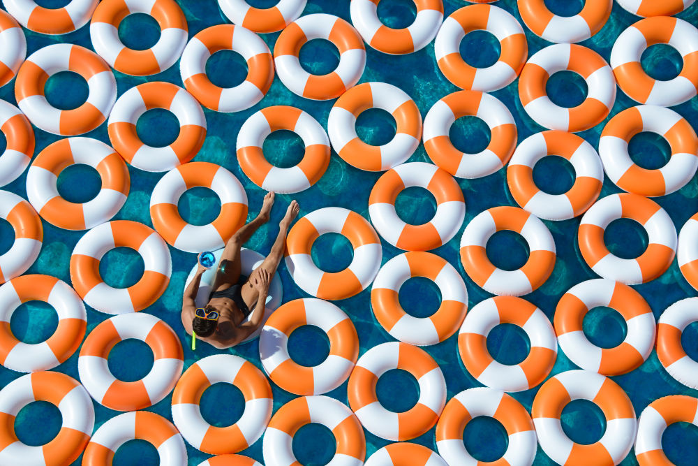 Photography by Gray Malin of Poolside Plunge