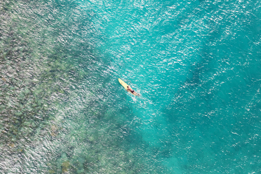 Photography by Gray Malin of St. Barths Paddle Surfer