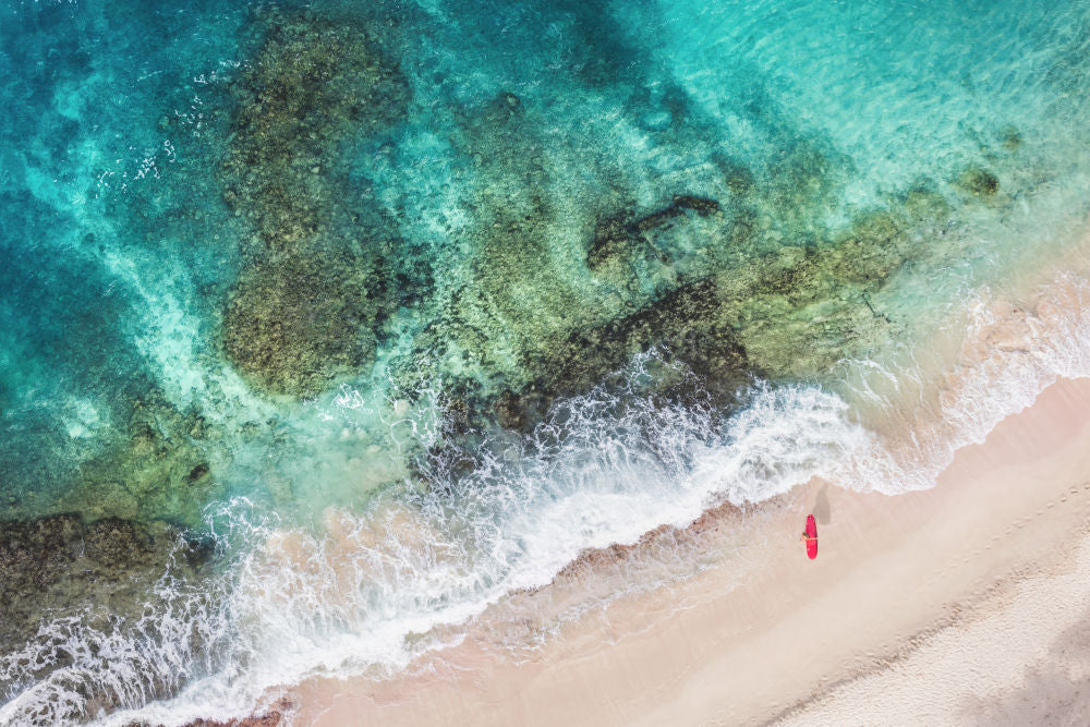 Photography by Gray Malin of St. Barths Red Surfboard