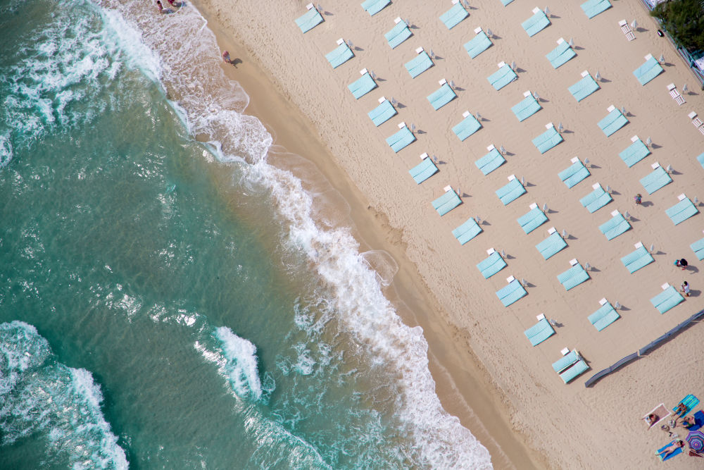 Photography by Gray Malin of St. Tropez Light Blue Beach Chairs
