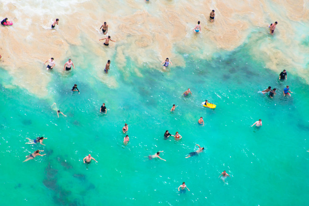 Photography by Gray Malin of Teal Ocean Swimmers