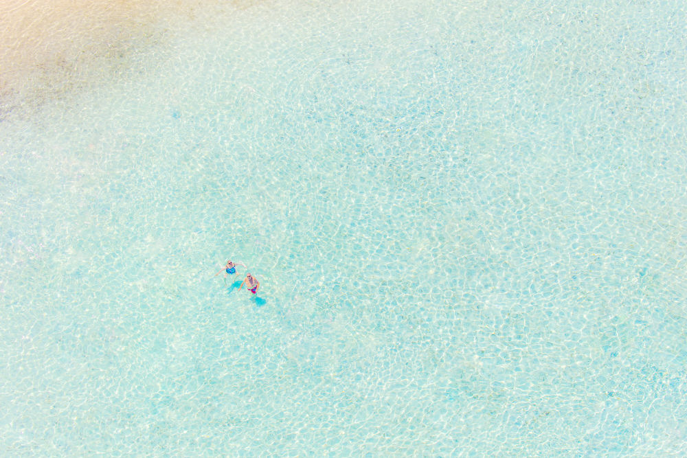 Photography by Gray Malin of The Vacationers, Bora Bora