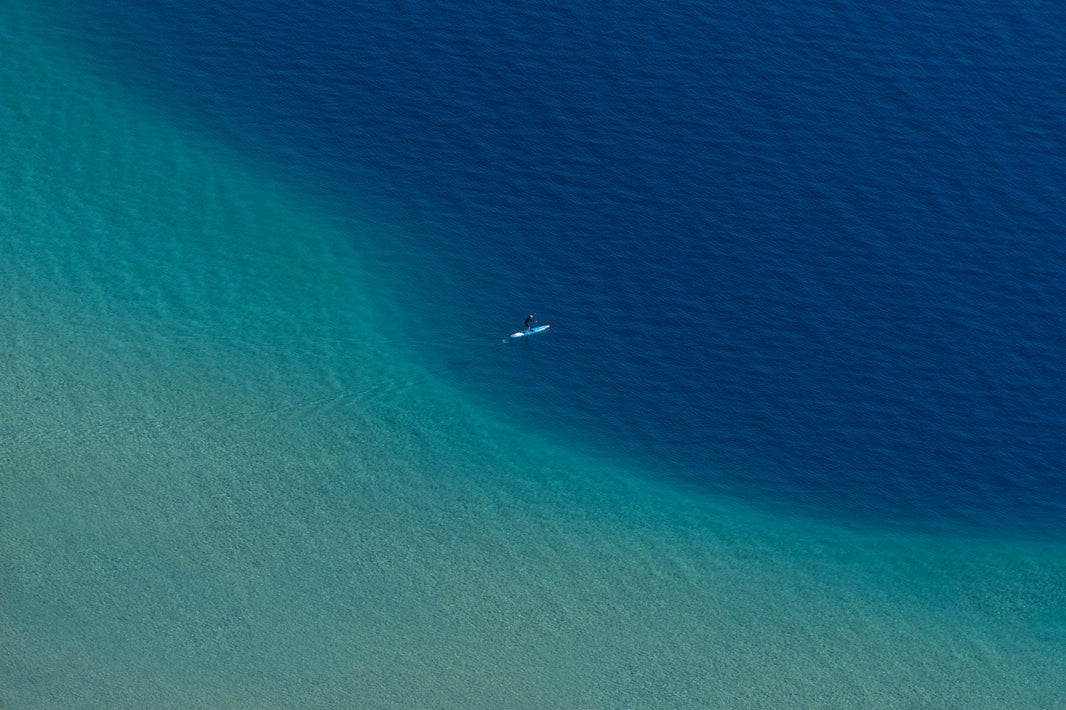 Photography by Gray Malin of The Paddleboarder, Lake Tahoe