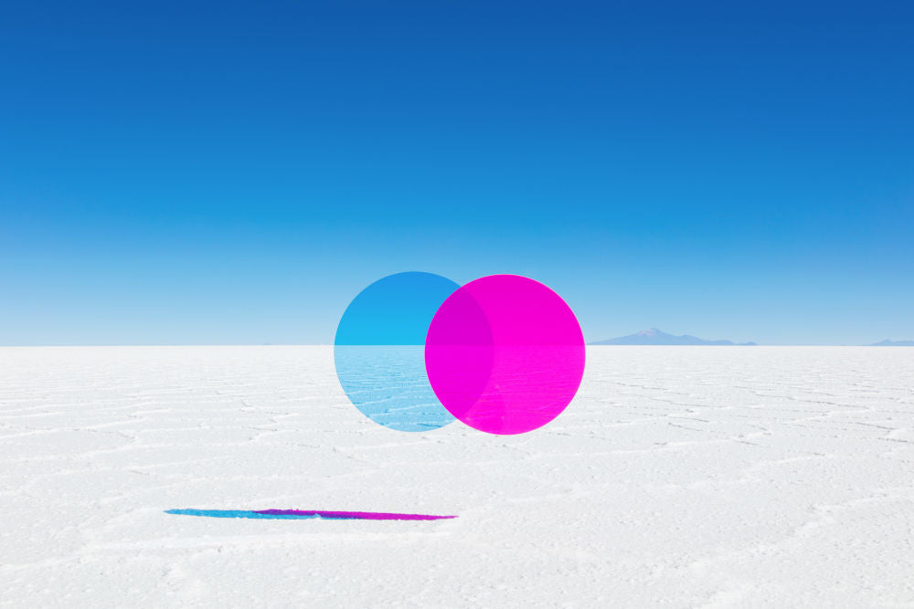 Photography by Gray Malin of Light Blue and Magenta Circles
