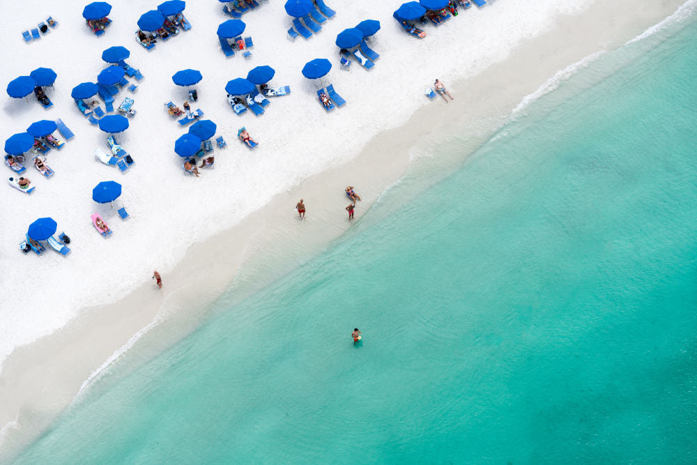 Photography by Gray Malin of Pelican Bay Blue Umbrellas, Naples, Florida