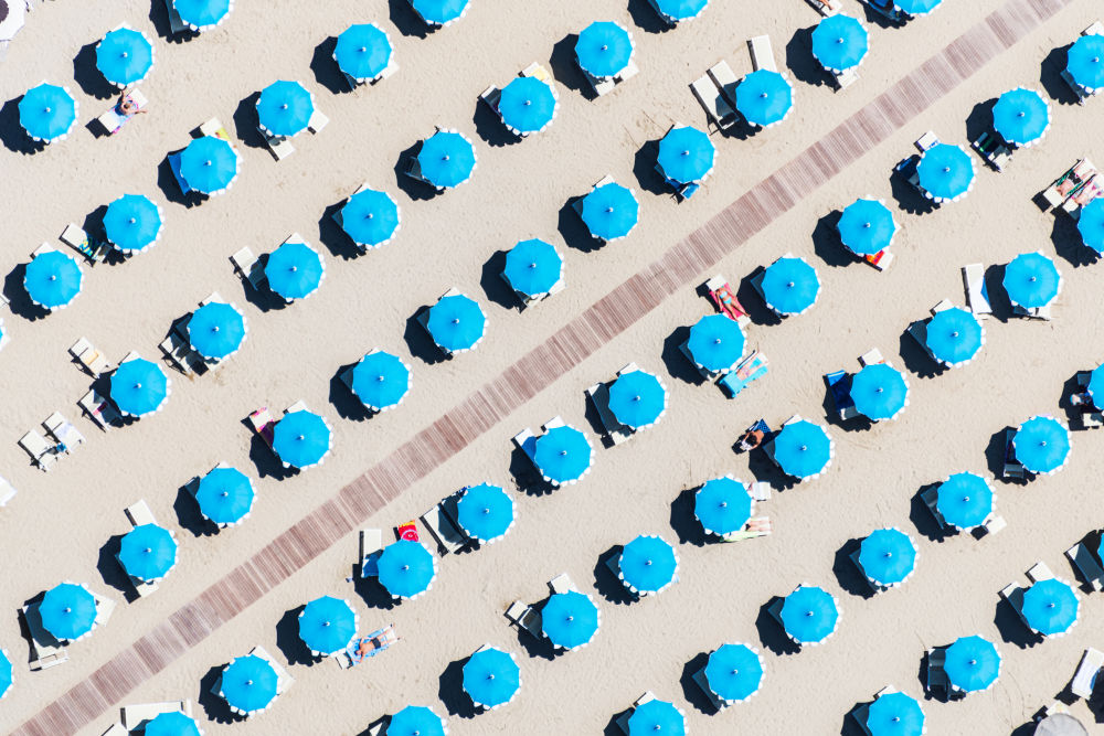 Photography by Gray Malin of Rimini Blue Umbrellas, Italy
