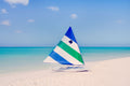 Green and Blue Striped Sailboat