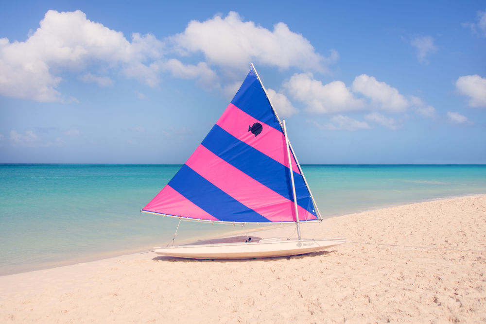 Pink and Blue Striped Sailboat