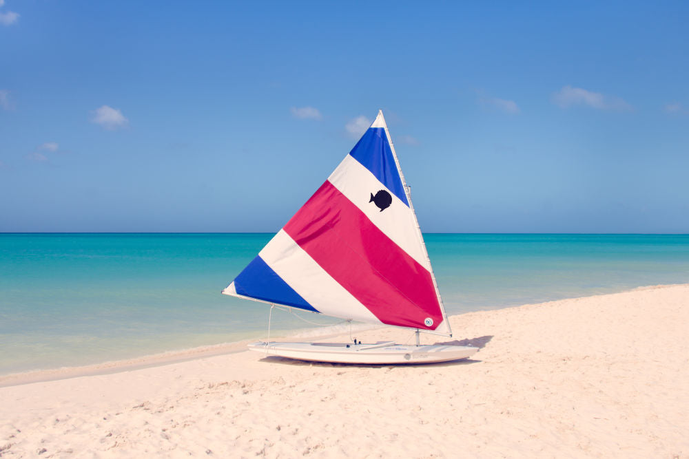 Red and Blue Striped Sailboat