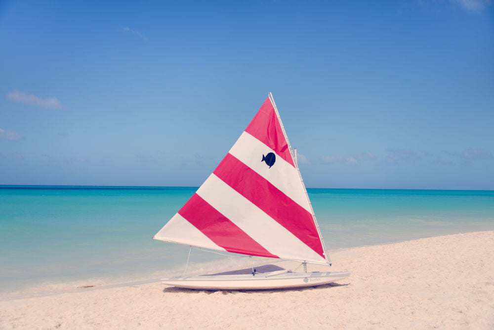 Red and White Striped Sailboat